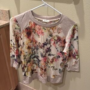Weston woman's sweater with flowers all over it. It's a 3/4 sweater